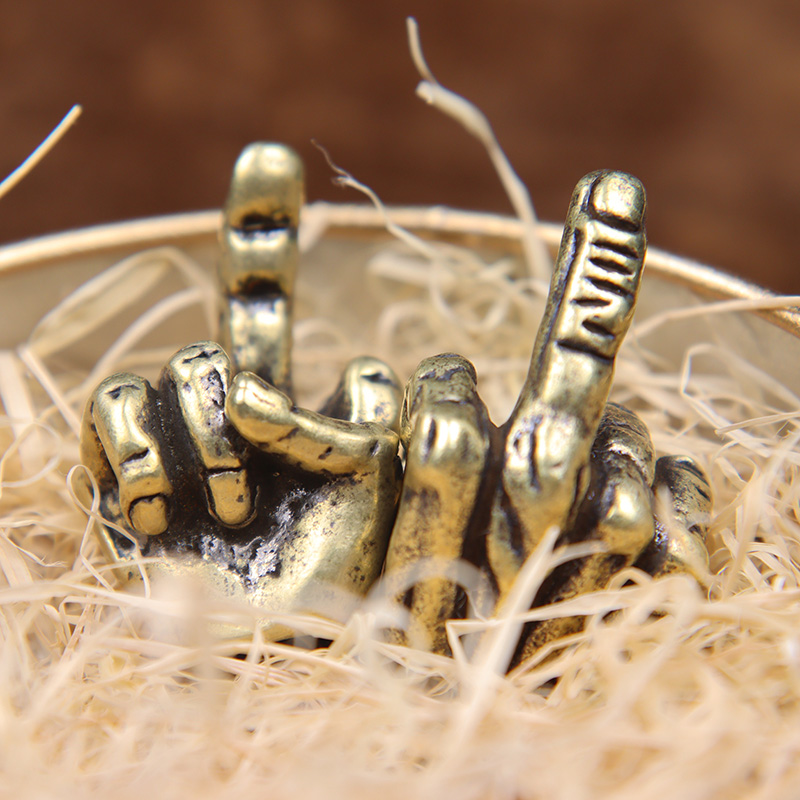 خرز نحاسي بتصميم إشارة الإصبع  - مراجعة Paracord Survival Bracelet وسعره
