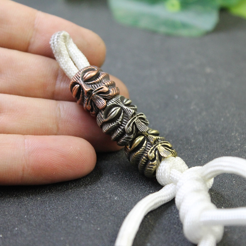 خرزة نحاسية بتصميم توتيم الماي - مراجعة Paracord Survival Bracelet وسعره